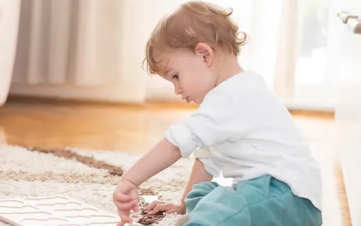 a child playing with sand
