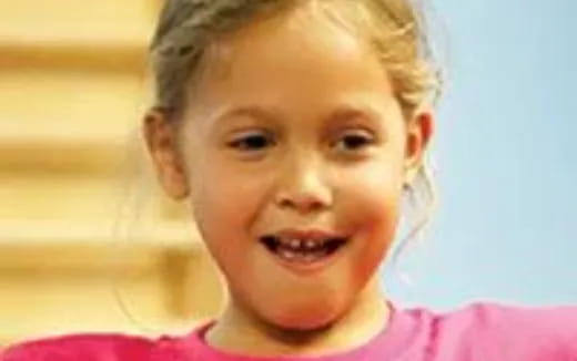 a child with blonde hair