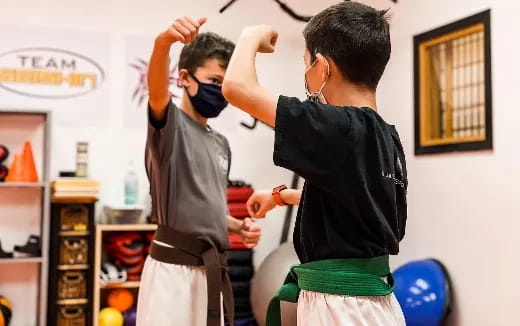 a couple of people wearing masks