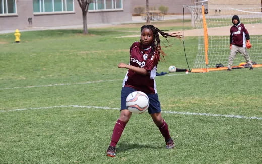 a girl playing football