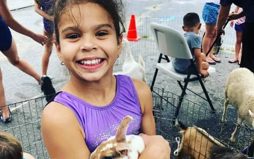 a girl smiling for the camera