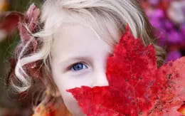 a girl with red flowers