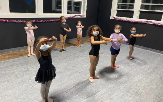 a group of children dancing