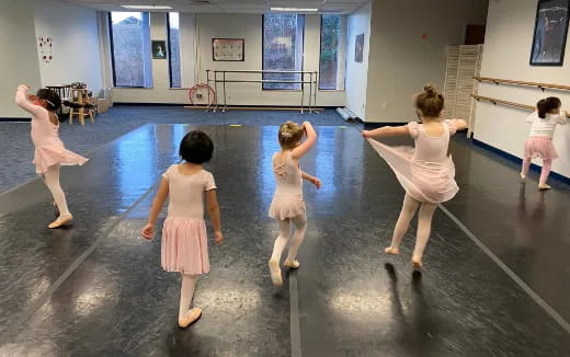a group of children dancing