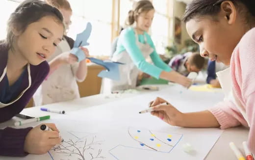 a group of children drawing