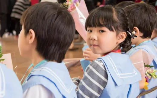a group of children in a classroom