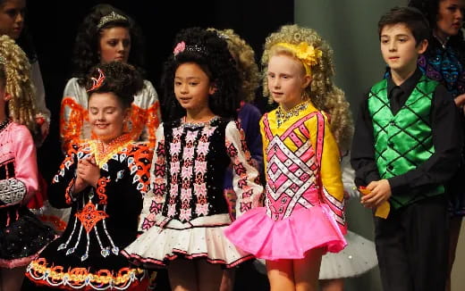 a group of children in clothing