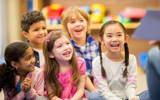 a group of children smiling