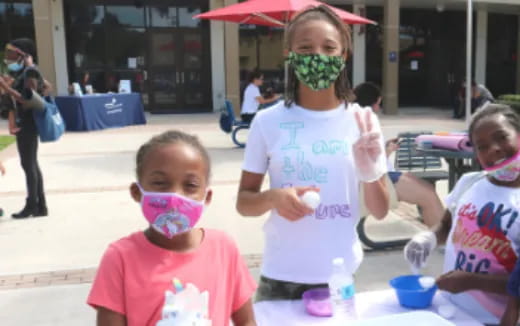 a group of children with face paint