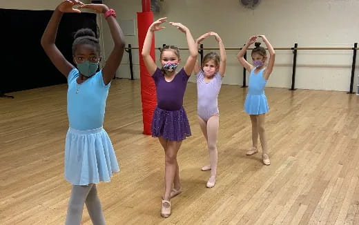 a group of girls in a gym