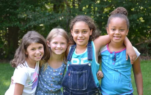 a group of girls posing for a photo