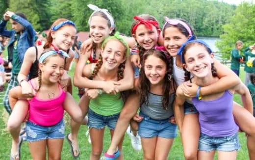 a group of girls posing for a photo