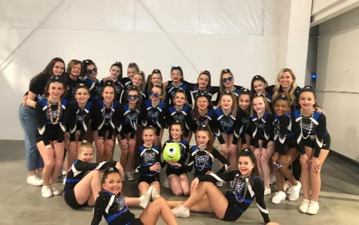 a group of girls posing for a photo