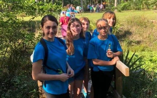 a group of girls posing for a photo