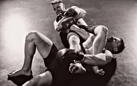 a group of men wrestling