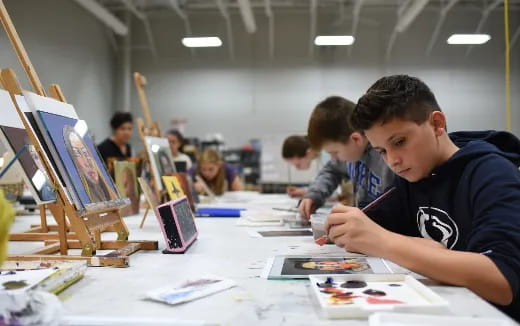 a group of people in a classroom