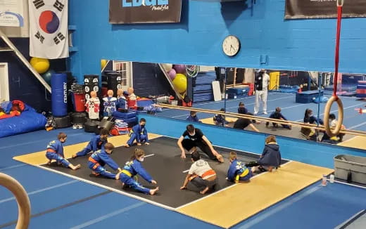 a group of people in a gym