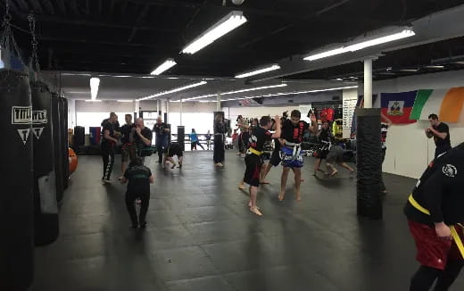 a group of people in a gym