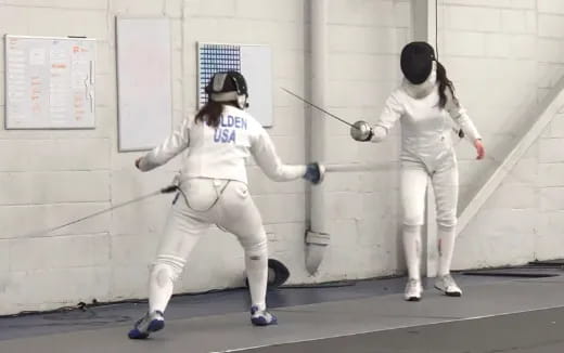 a group of people in white uniforms