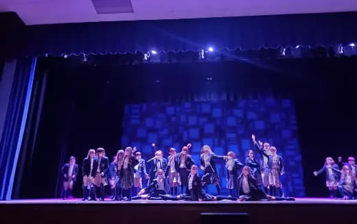 a group of people on a stage