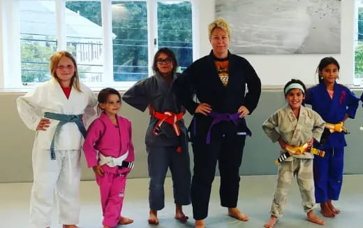 a group of women posing for a photo