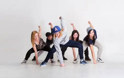 a group of women posing for a photo