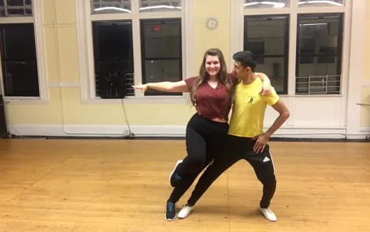 a man and woman dancing