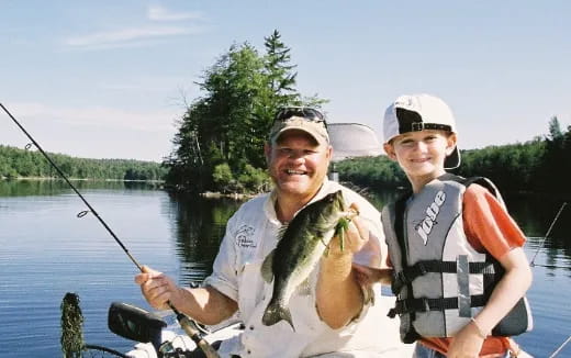 a person and a boy fishing