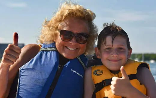 a person and a boy posing for a selfie