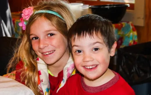 a person and a boy smiling