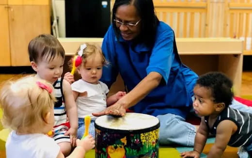 a person and several children