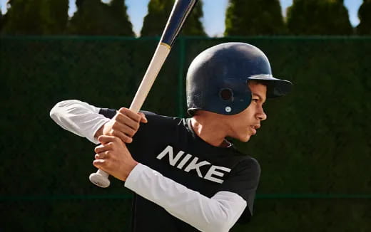 a person holding a baseball bat