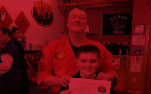 a person holding a child