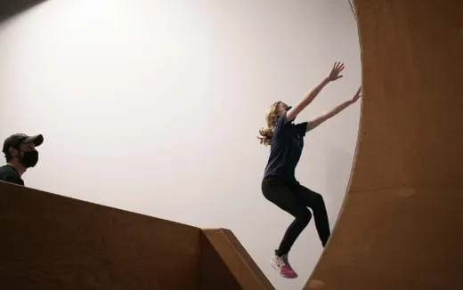 a person jumping on a ramp