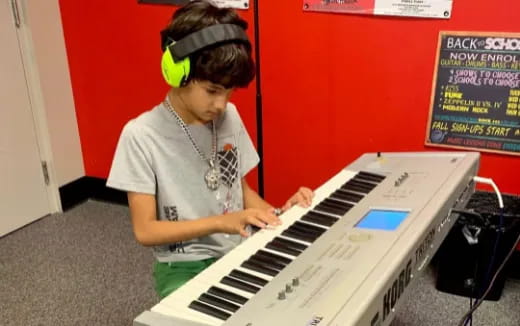 a person playing a piano
