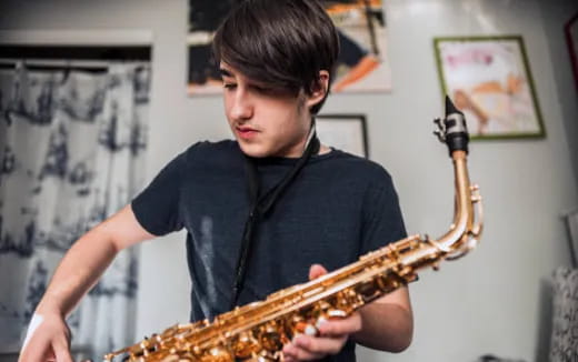 a person playing a saxophone