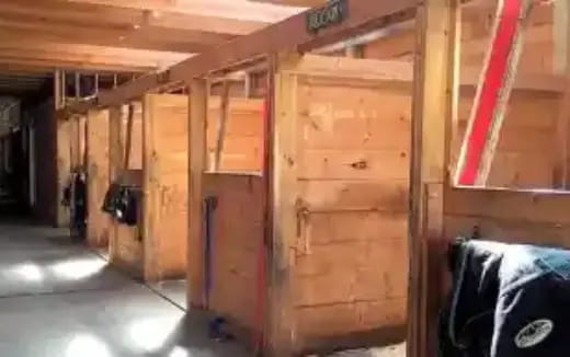 a room with a few wooden cabinets