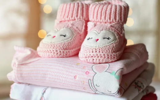 a stuffed animal on a bed