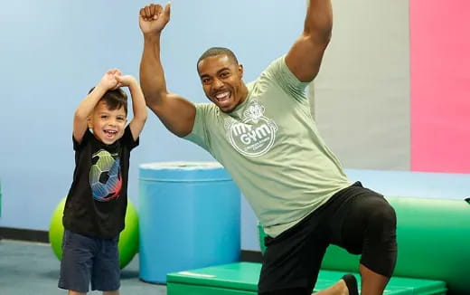 a woman and a girl posing for a picture