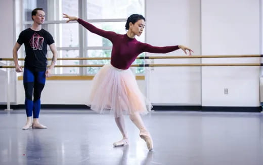 a woman dancing on a stage