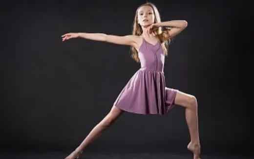 a woman dancing on a stage