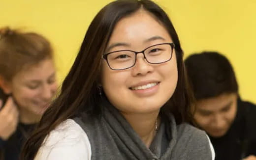a woman smiling for the camera