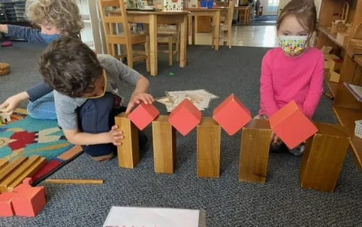 children playing with building blocks
