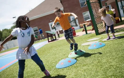 kids playing with frisbees