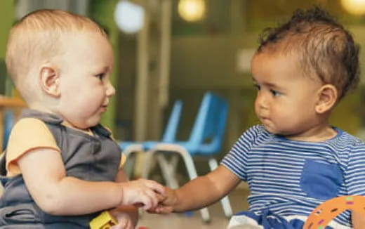 medium shot of kids sitting next to each other