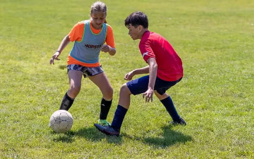 two boys playing football