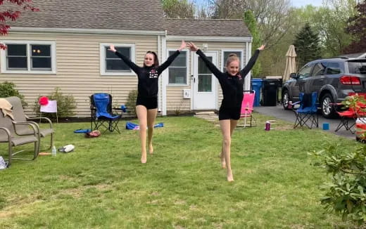 two women jumping in the air