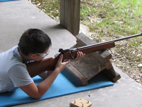 a man holding a gun