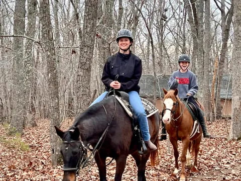 a group of people riding horses