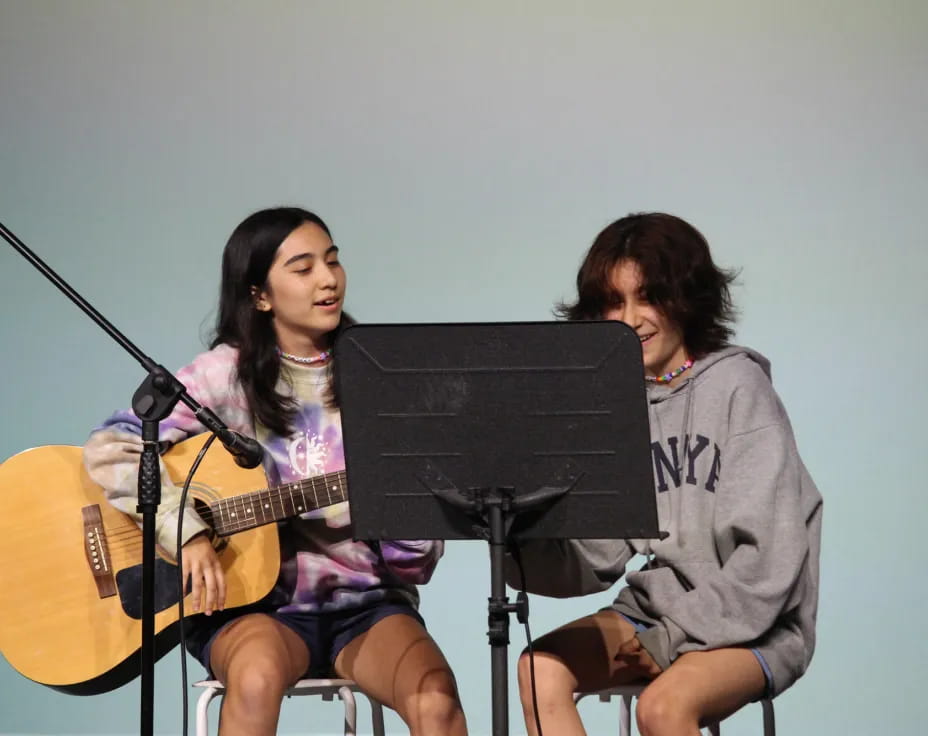 a couple of women playing instruments